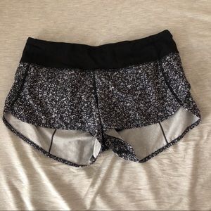black and grey floral lululemon shorts